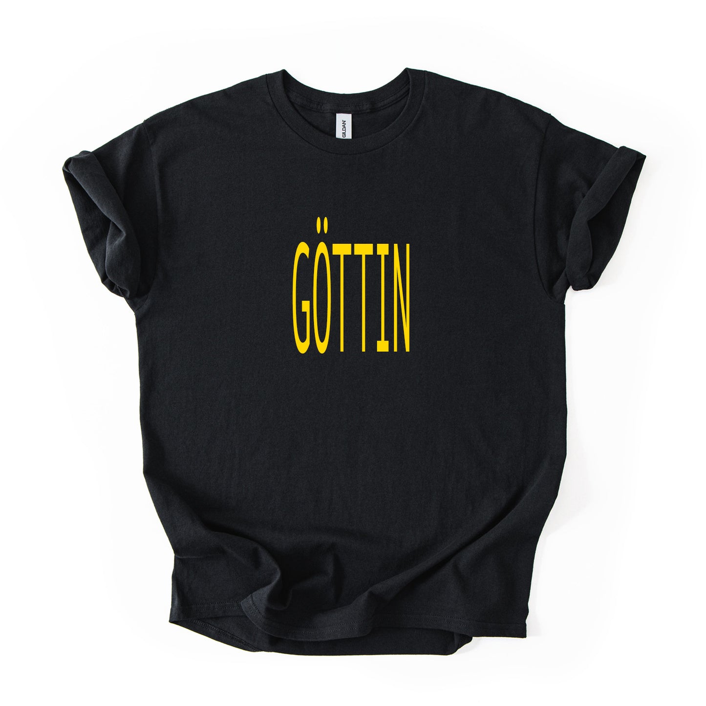 Das T-Shirt GÖTTIN in Schwarz mit goldenem Print – Oversize, bold & limitiert. Dein Powerpiece von Mimi Schnee für starke Heldinnen-Momente. Jetzt shoppen!
